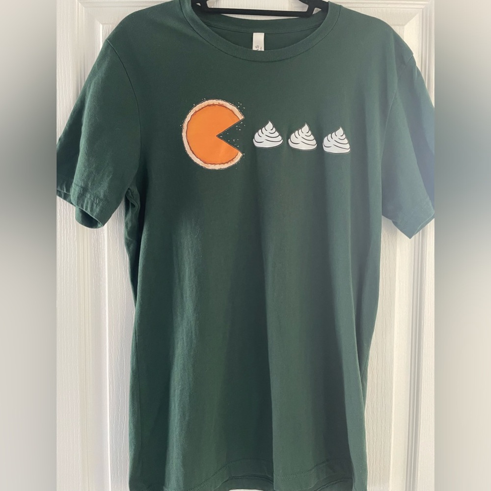 Green Christmas or thanksgiving pumpkin pie Pac-Man t-shirt 
Womens Large